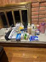 Full lot of toiletries, scale, caddy, bandages, cotton products and cups