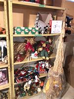 Full view of beige metal shelving with contents (not included)