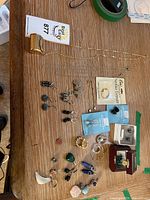 Overview of all jewelry items laid out on table