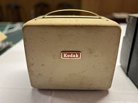 Beige Kodak Brownie 310 projector exterior with Kodak badge