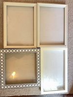 Front view of all four shadow box frames