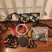 Overview of lot with fans, cables, charger, USB board and bagged cables