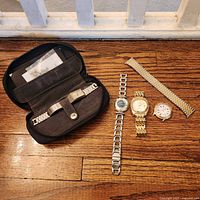 Overview of all watches, spare bracelet and Guess case