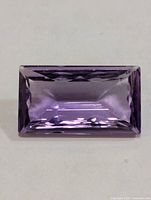 Top view of rectangular amethyst showing color and cut