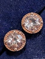 Front view showing both earrings and stones