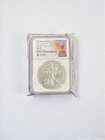 NGC-slabbed coin in sealed plastic