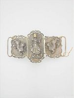 Full view of three-panel Burmese silver belt buckle closed