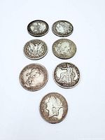 Front faces of seven coins