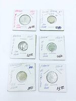 Front of all six coins in flips showing annotations