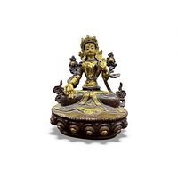 Front view of gilt bronze White Tara seated on double-lotus base