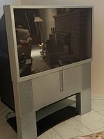 Front view of Sony rear projection TV on pedestal stand