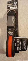 Single packaged Glow Pets LED collar showing branding, size S, black/red design