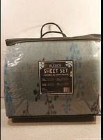 Front view of sealed fleece sheet set package