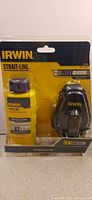 Front of sealed IRWIN Strait-Line Speedline chalk reel kit showing reel and chalk bottle