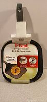 Griddle with original cardboard sleeve showing T-fal Simply Cook branding