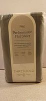 Front of sealed package showing Threshold Performance Flat Sheet king