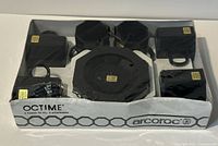 Retail box containing six black Octime cups and six saucers