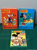 Front covers showing albums No.128, No.126 and issue No.92