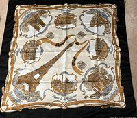 Full view of scarf showing design and border