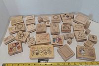 Front view showing all wood-mounted rubber stamps with design sides visible