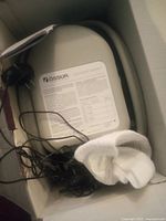 Cold Rush Compact unit in box with power cord, knee pad and paperwork visible