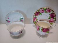 Front view of teacup, saucer, sugar bowl and underplate