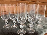 Group of 10 crystal wine glasses with faceted stems