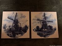 front view of both Delft blue windmill tiles