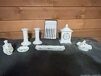 Group shot of all eight porcelain and cutlery items