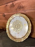 Front view of porcelain plate with glass overlay assembled