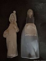 Front view of both Lladro figurines