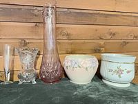 Group shot showing all five vases and planters lined up