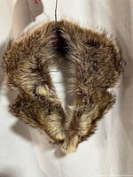 Front view of raccoon fur collar wrap