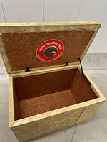 Open chest showing clean brown interior and red Lewyt label with vent plug