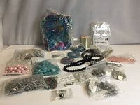 Group shot of all bead bags, strands, findings, pouches and thread