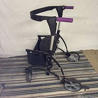 Left side view of Invacare Dolomite Jazz rollator walker showing side-folding frame and basket