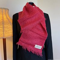 Scarf displayed on mannequin to show size and drape