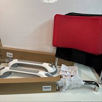 Two suction grab bars, boxed grab bar, red Mybow headrest extension