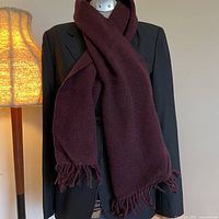 Scarf draped on blazer showing overall look and color