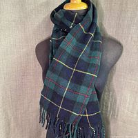 Scarf draped on mannequin showing overall pattern and length