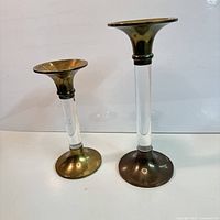Front view of both candlesticks showing height difference and overall design