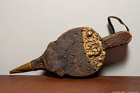 Full view of bellows showing brass tip and decorative plate