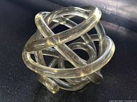 Overall view of clear glass knot sphere