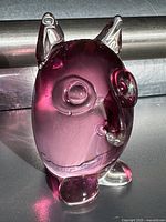 Front view of pink Murano glass owl figurine