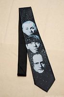Front view of full Ralph Marlin Three Stooges tie