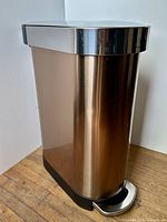 Full view of Simplehuman rose gold slim step can
