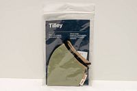 Front of sealed Tilley package showing three masks