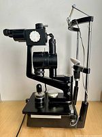 Full left-side view of Topcon Super IA slit lamp on tabletop