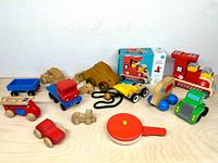 All eleven wooden toys displayed on tabletop