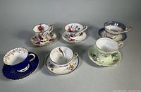 All six bone china teacup and saucer sets arranged for overview